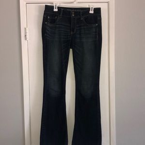 American Eagle “Artist” dark wash bootcut jeans.